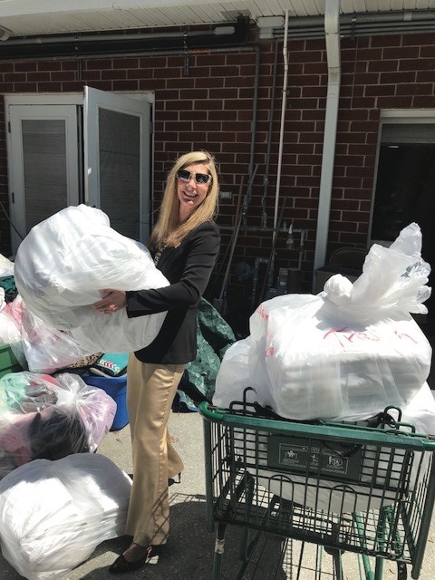 Founders Inn employee volunteering at SPCA