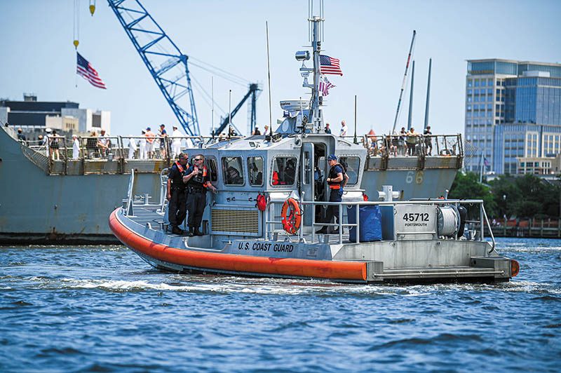 Members from Coast Guard station Portsmouth underway maintaining safety zones and enforcing safe boating practices during the 2024 Norfolk Harborfest event in Portsmouth, Virginia, June 7, 2024. To assist in maintaining a safe waterway, Coast Guard Sector Virginia crews, along with regional partners, enforced a safety zone limited the use of the Elizabeth River Channel June 7-9. (U.S. Coast Guard Photo by Petty Officer 2nd Class Ryan L. Noel)
